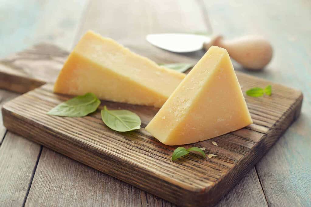 sliced vegan cheese on a cutting board