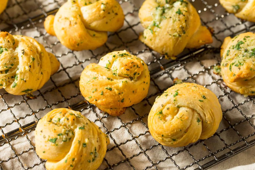 homemade buttery garlic knot bread with parsley
