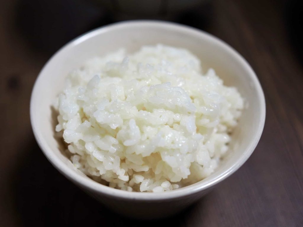 mushy rice in a ceramic bowl