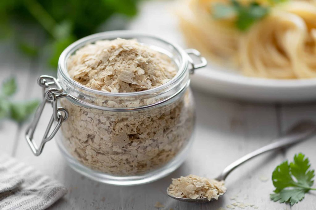 nutritional yeast flakes in a jar