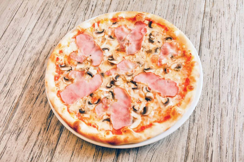 Can I Put Fresh Meat or Veggie Toppings on Frozen Pizza?