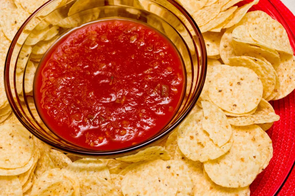 Tomato Salsa and Tortilla Chips on a plate