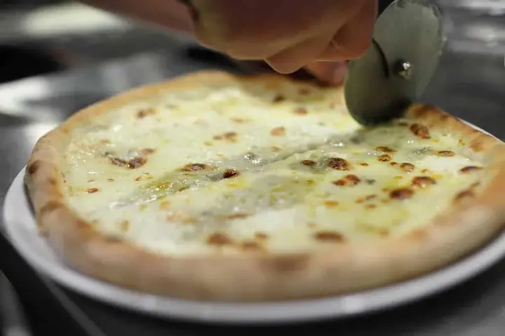What Is White Pizza? Is It Healthier? Sauce, Toppings, and More