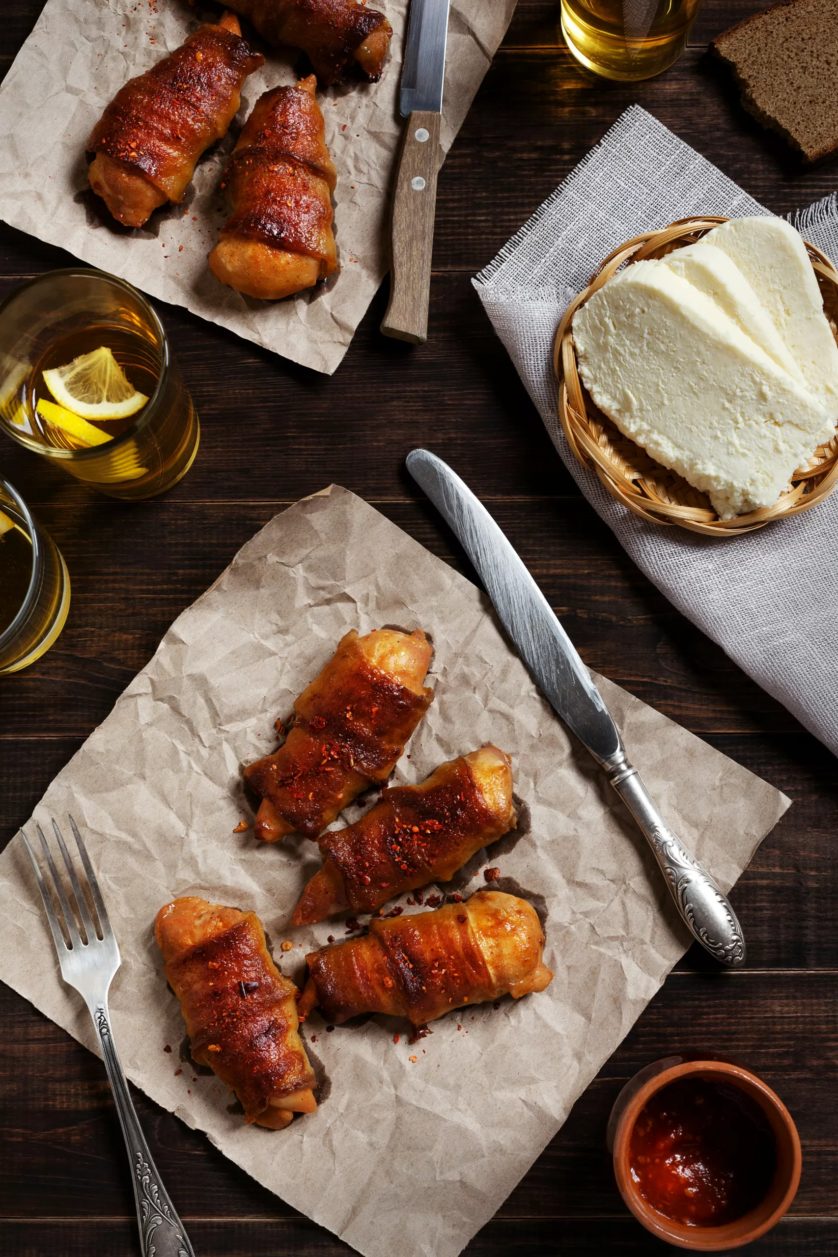 Paleo pizza-stuffed chicken with cheese on the side.