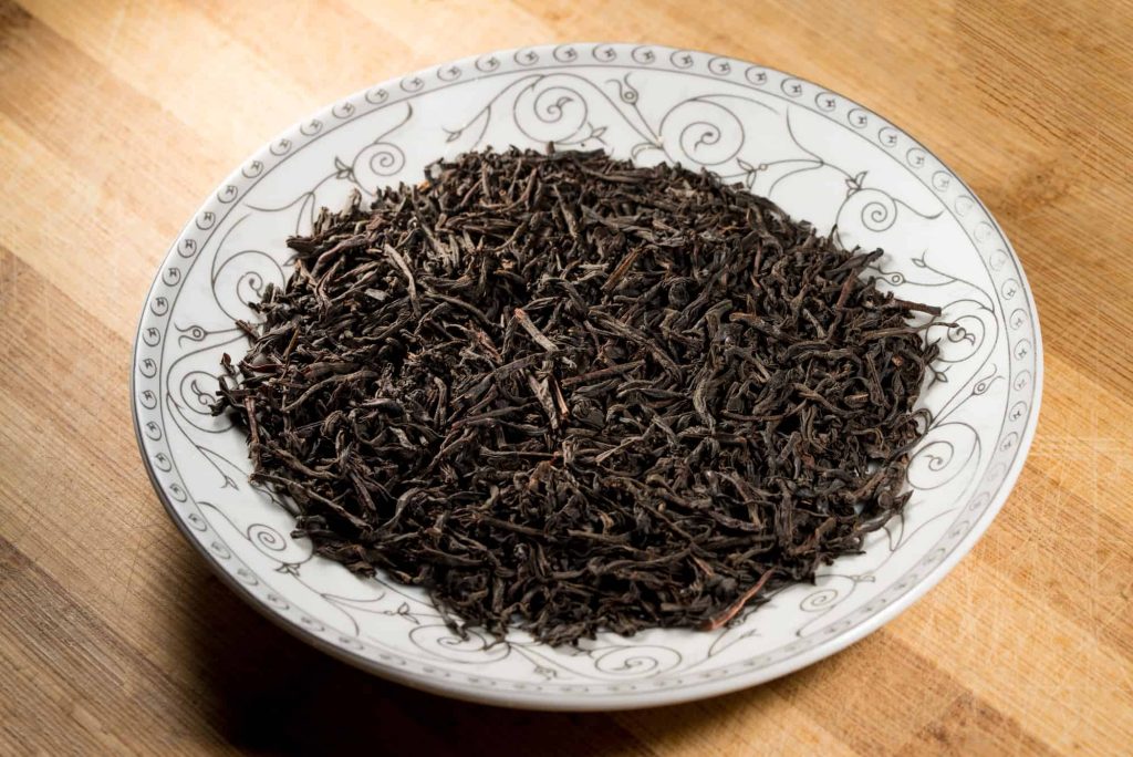 black tea leaves on a plate