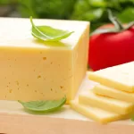 vegan cheese with basil and tomato