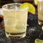 homemade classic margarita drink with lime and salt