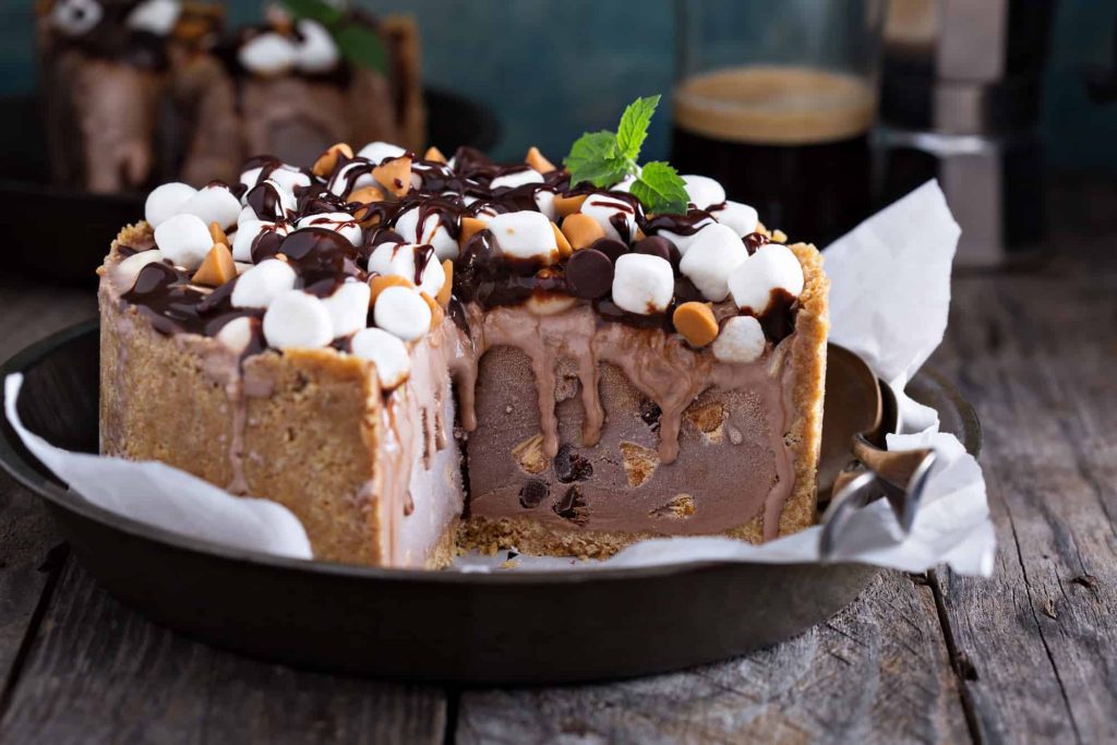 rocky road ice cream cake with peanuts, marshmallows and chocolate chips