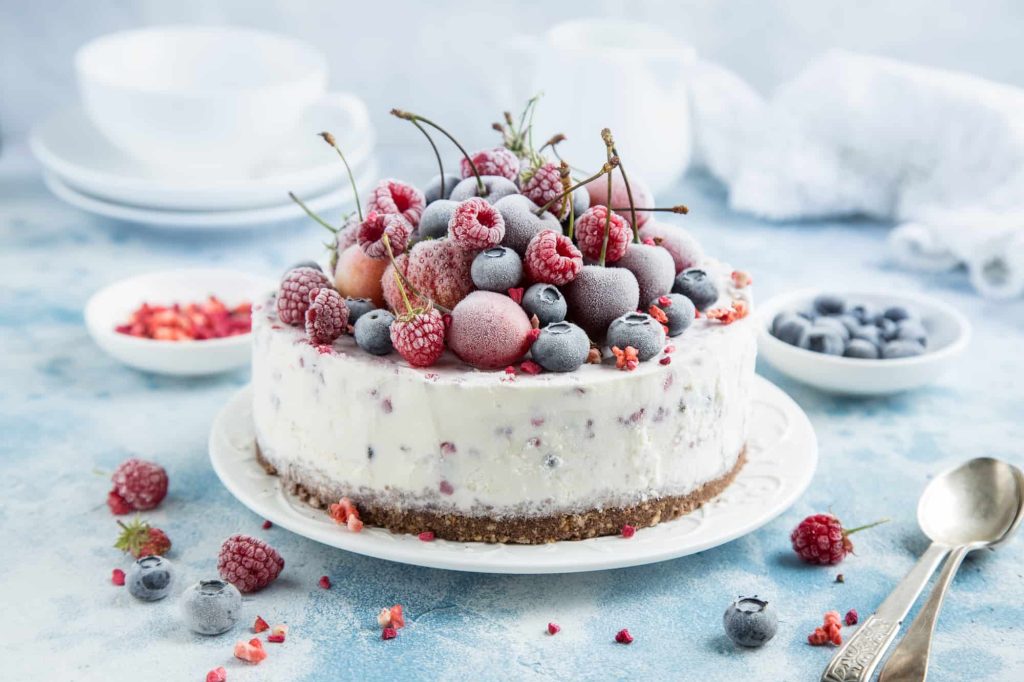 vanilla ice cream cake with berries on top