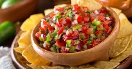 delicious homemade pico de gallo in a bowl with tortilla chips