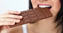 woman eating chocolate