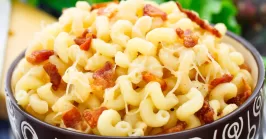 Delicious mac and cheese with bacon in a bowl