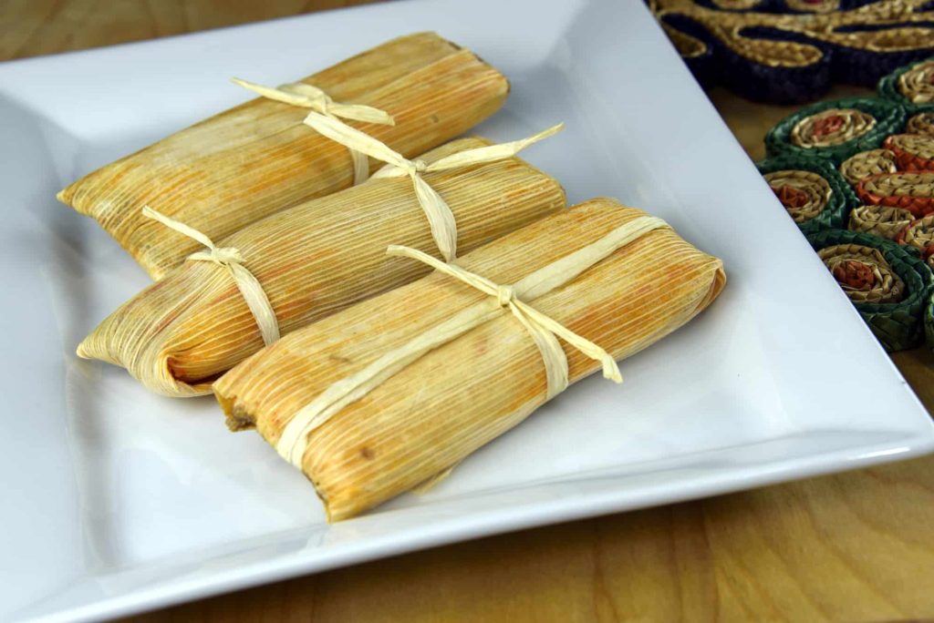 traditionally prepared tamales wrapped in corn husks