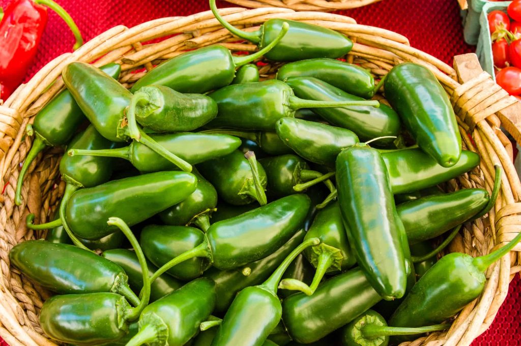 jalapeno peppers in a basket