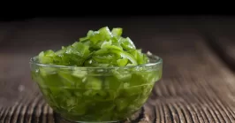 diced jalapenos in a bowl on a table