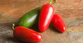 red jalapenos on a table