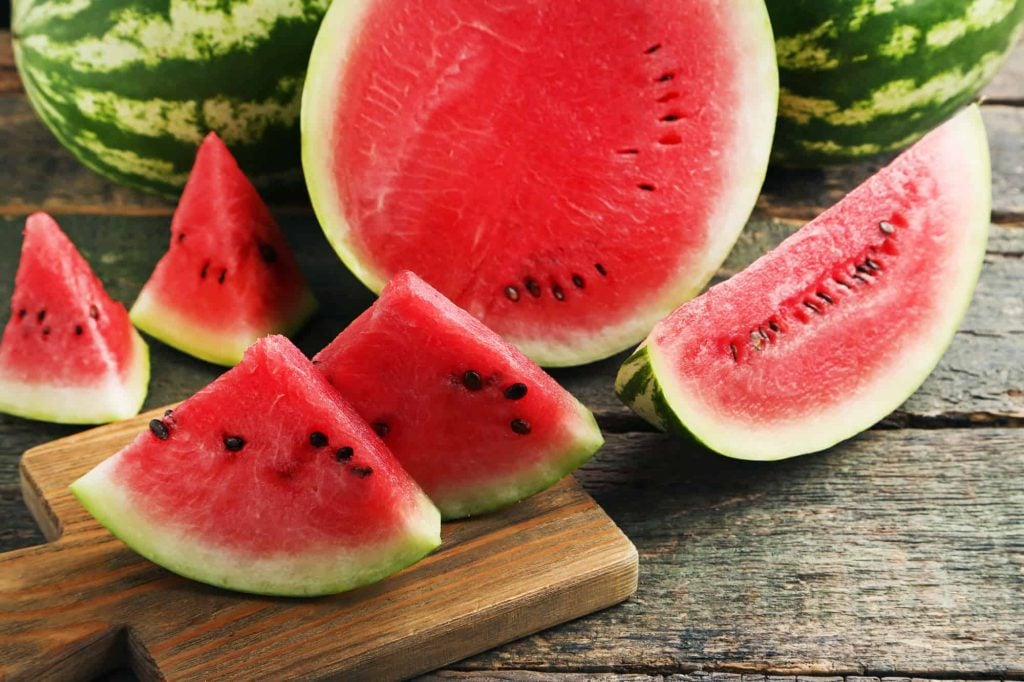 Slices of watermelons on cutting board