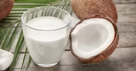 coconut and coconut milk in a glass