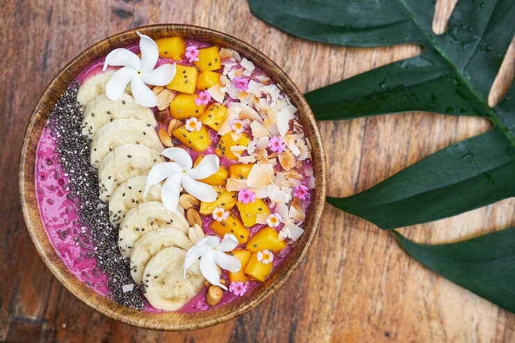 Tropical breakfast fruit homemade acai bowl