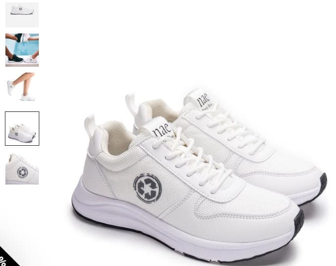 White vegan sneakers featuring a Star Wars logo, designed by NAE, made from recycled PET materials.