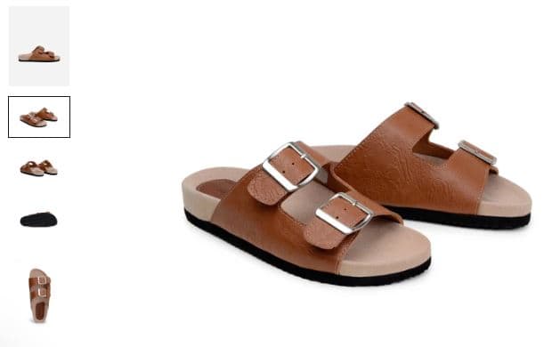  Limited Edition Truda Vegan Leather Two-Strap Sandals with buckles alongside a stylish pair of shoes.