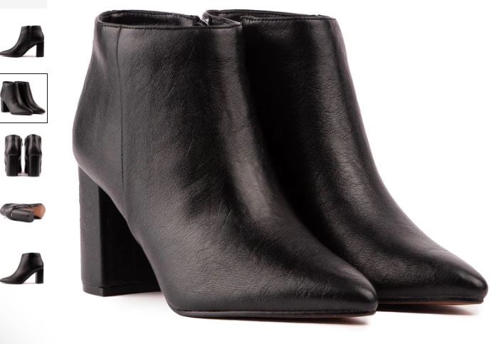 A pair of black leather ankle boots with heels, featuring the Nectarine Vegan Leather design by V.GAN.