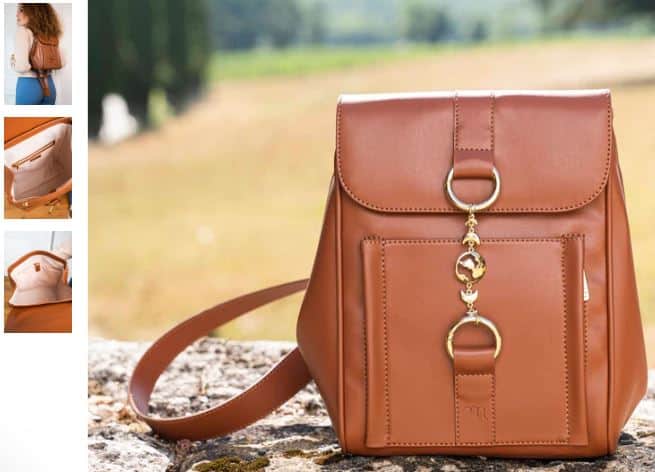 A brown leather backpack and purse set, featuring the Falabella in chestnut by Minuit sur Terre, elegantly displayed together.