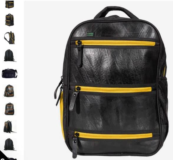 A black backpack featuring yellow zippers, showcasing the Tiger Upcycled Tire Vegan Backpack by Ecowings.